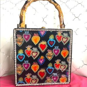 Unique glass faced purse with bamboo handle